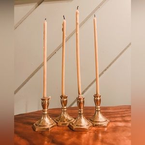 Set of 4 brass candlesticks